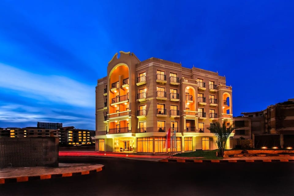 Arrive to a glowing façade that promises a memorable stay.
