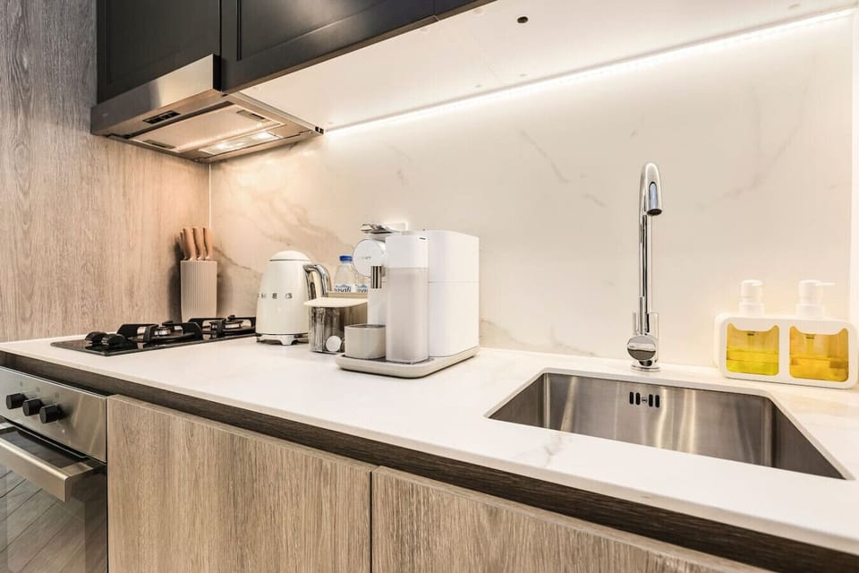 Gourmet Kitchen: Sleek marble countertops and top-notch appliances for culinary adventures!