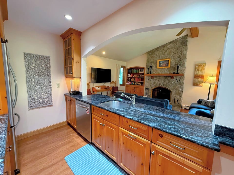 Soak in the warmth and charm of this inviting mountain escape