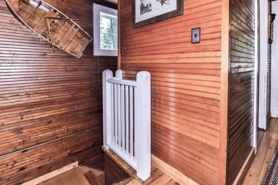 Stairs from upper level leading down.