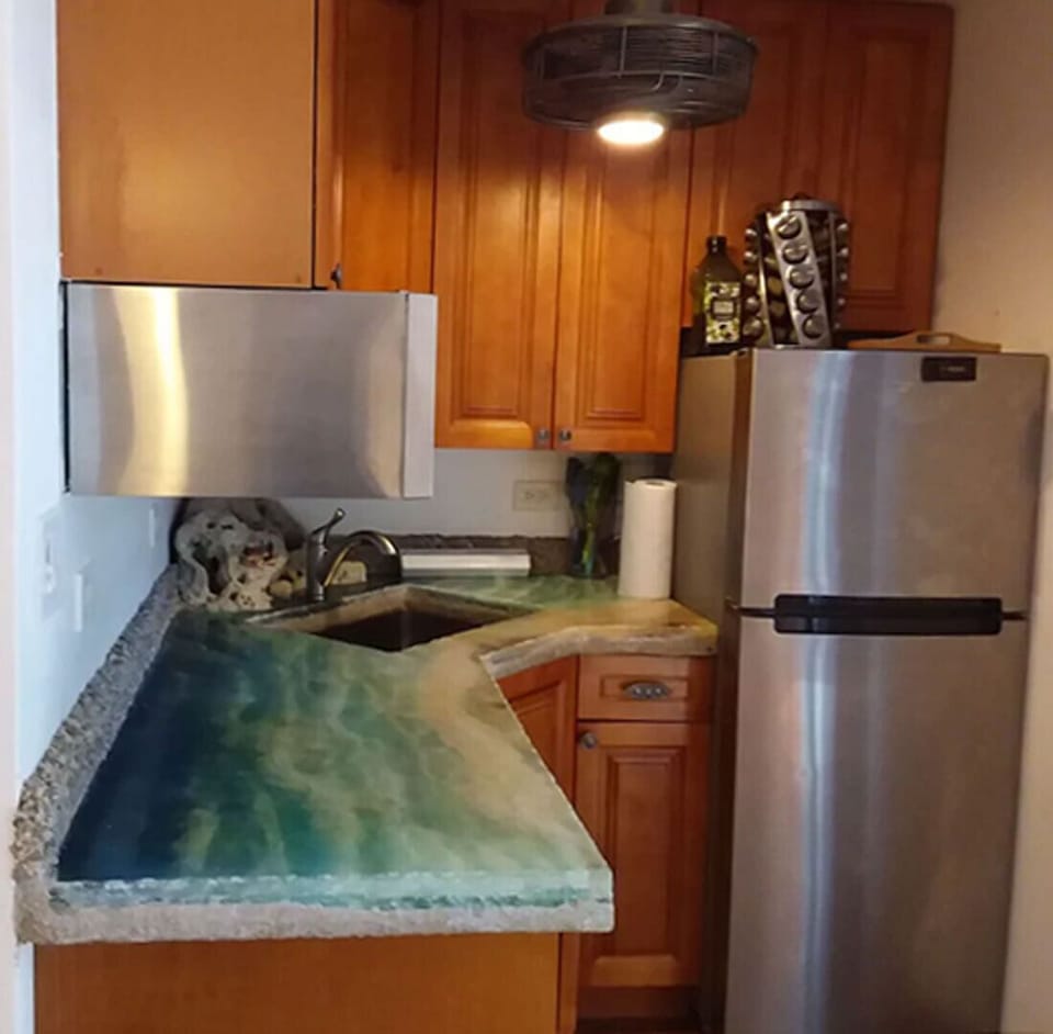 Custom kitchen with seascape countertop.