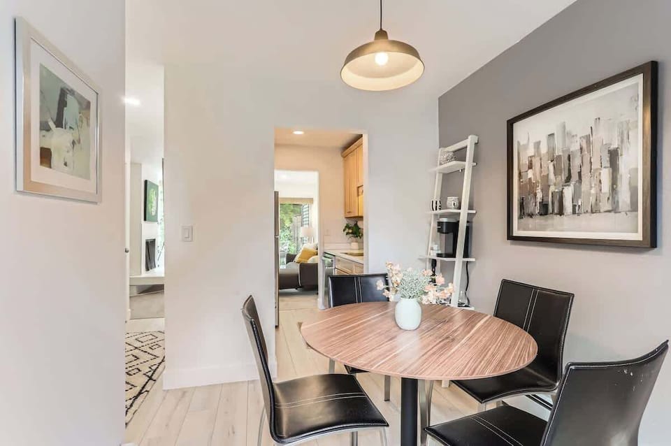 Dining table leading into the kitchen 