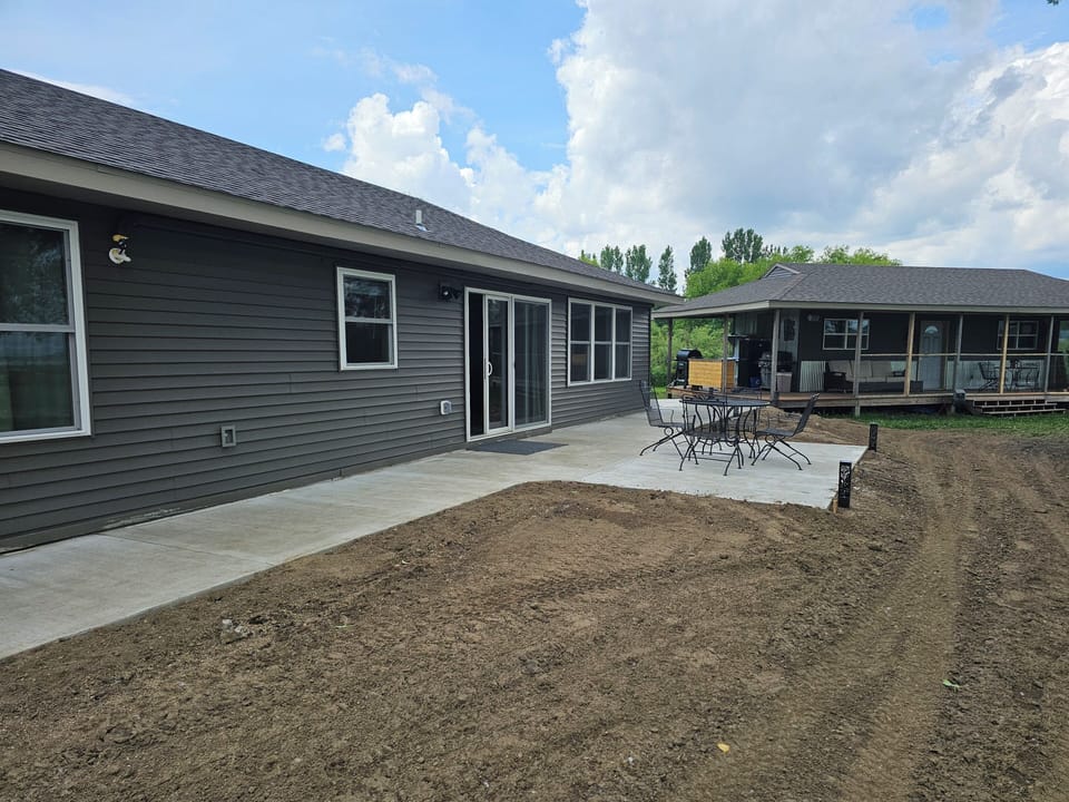 since we took this picture, we have grass and added a hot tub. 