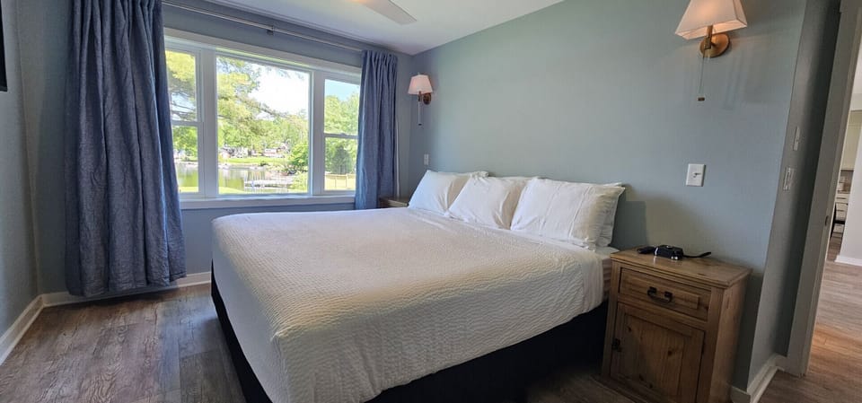 Sleep like royalty with lake air and a king-size bed.