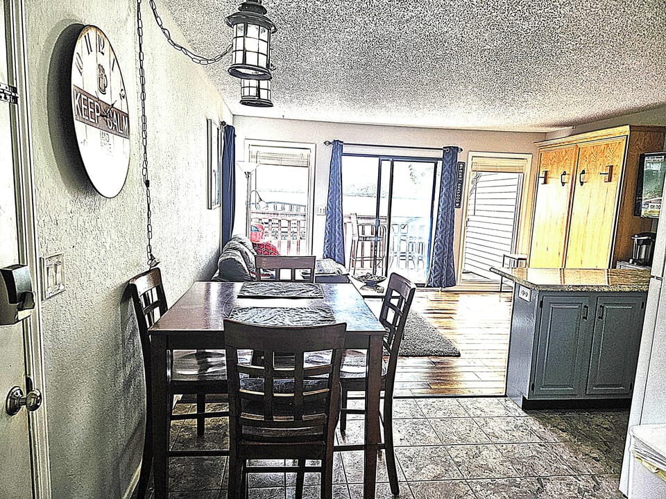 View from bedroom door through condo to the lake.