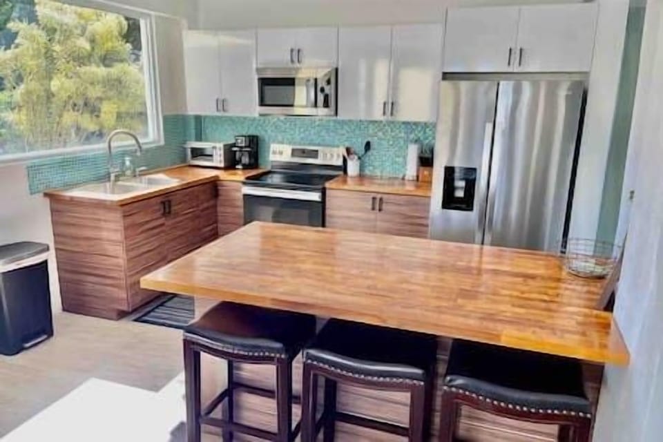 Kitchen with island seating.