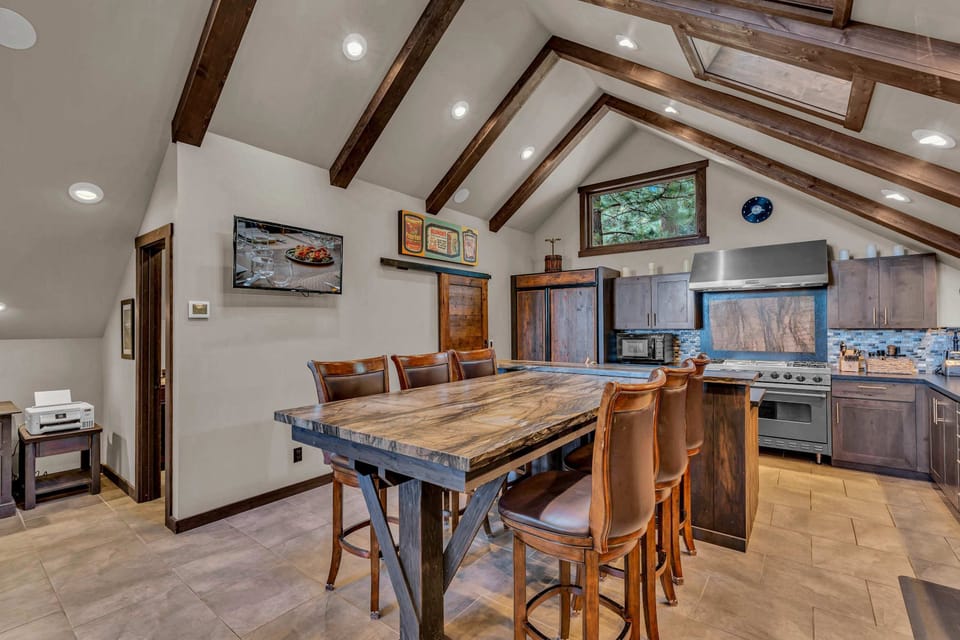 Dining area: Second floor. The dining table seats 8, and the bar height table in the kitchen seats 6.