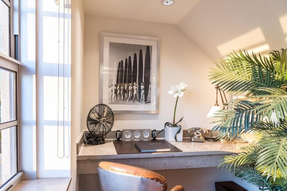 Focus comfortably at the cozy desk with calming afternoon light.