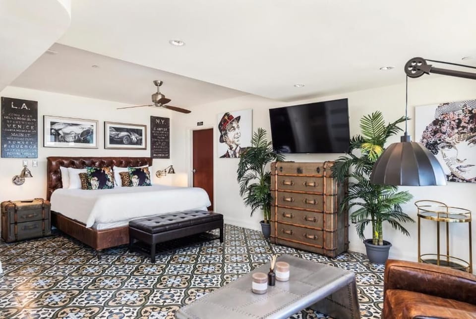 Unwind in a spacious king suite with curated art.