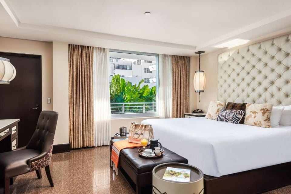 Settle into a spacious king room with calming, soft textures.