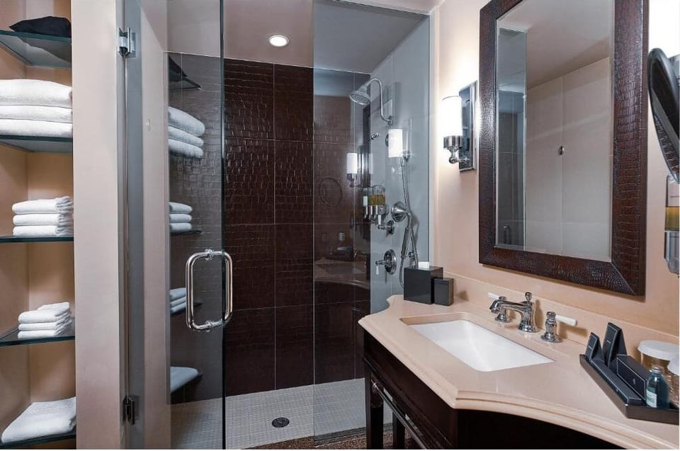 Enjoy a spotless vanity and glass shower after beach days.