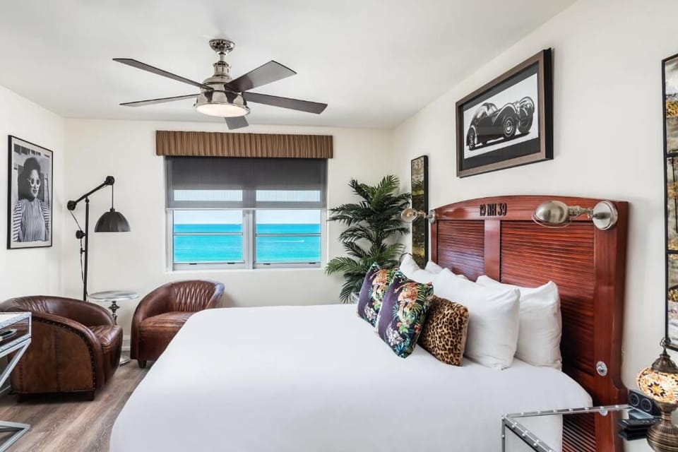 Relax in a stylish room framed by soothing sea views.