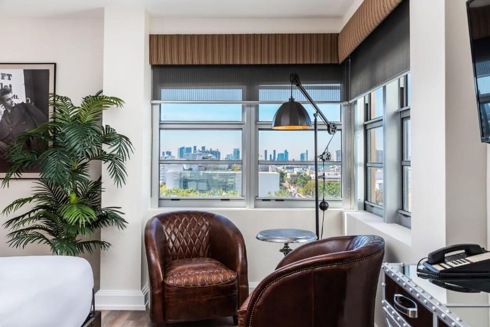 Sip coffee by the window and watch the skyline glow.