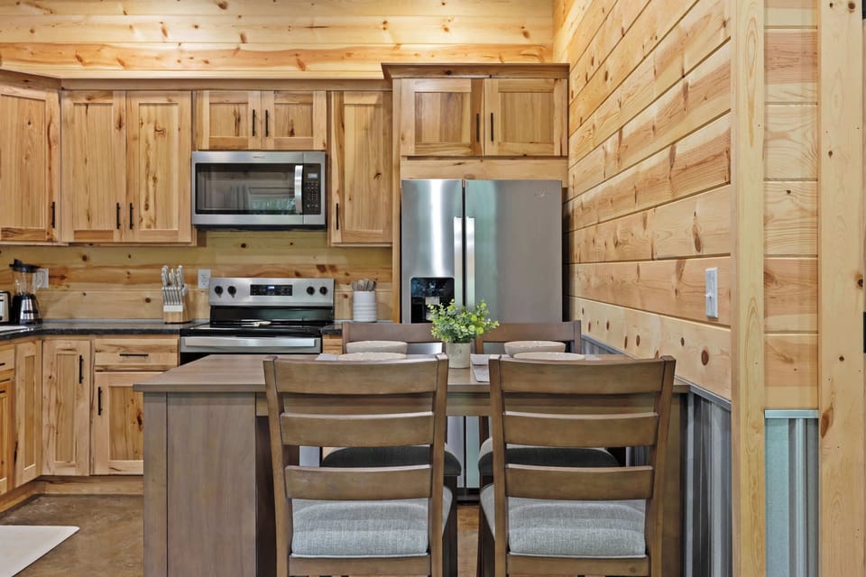 Kitchen: The heart of the home! Our open kitchen and dining area are perfect for gathering, sharing stories, and making memories.