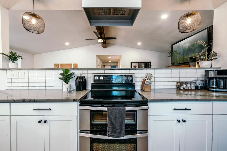 Don't miss out on the family and friends' adventures while in the kitchen. You will love the open kitchen/living concept.