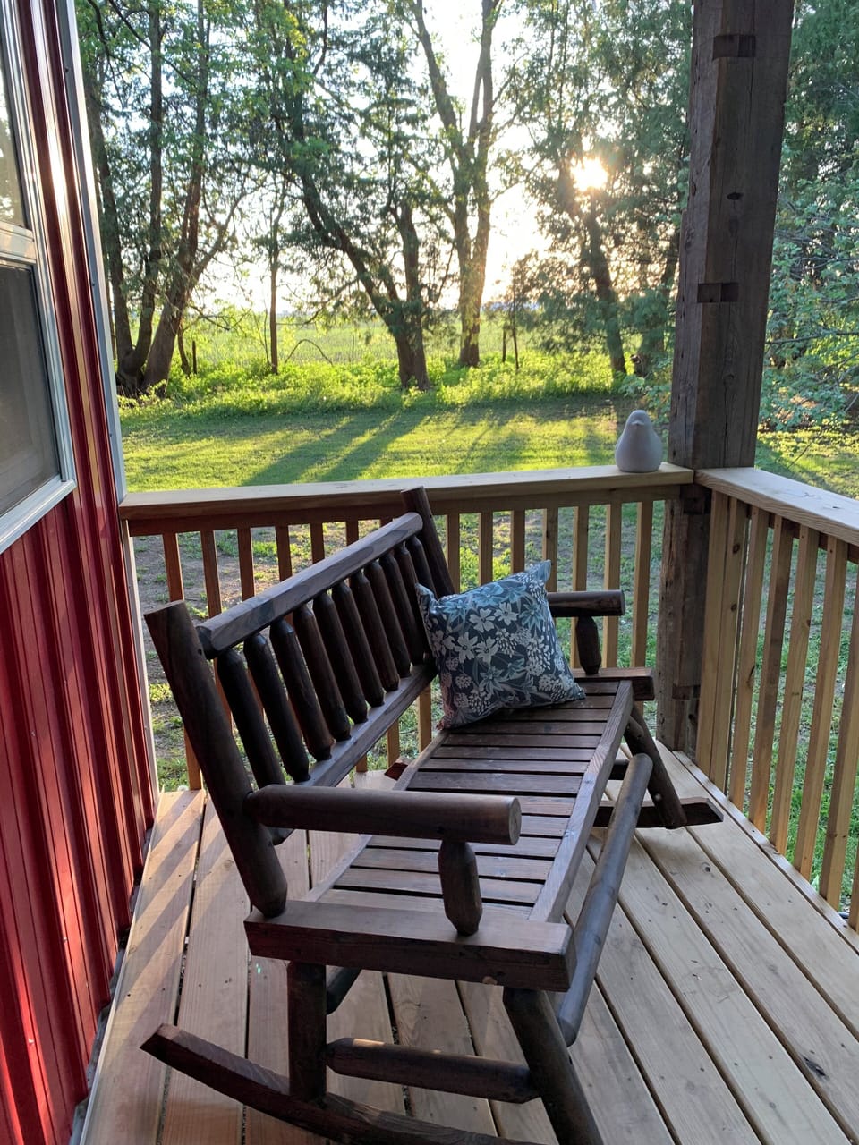 Double rocker on the front porch is a perfect place to relax