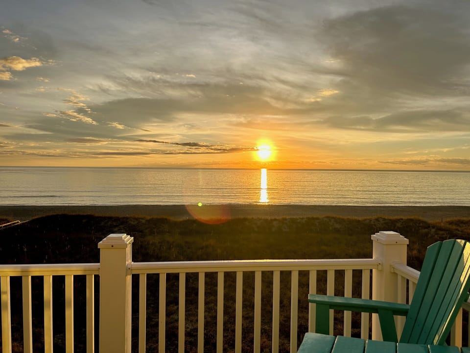 Golden sunrise over dunes