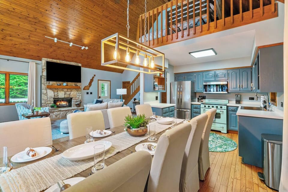Open kitchen and dining area—perfect for shared meals, game nights, and making Door County memories.