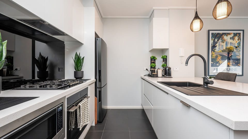 Sleek, modern equipped stocked kitchen