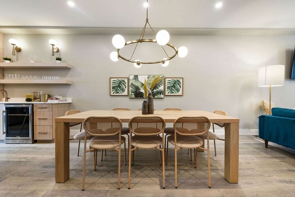 Gather around the elegant dining table, perfect for meals and memorable moments.