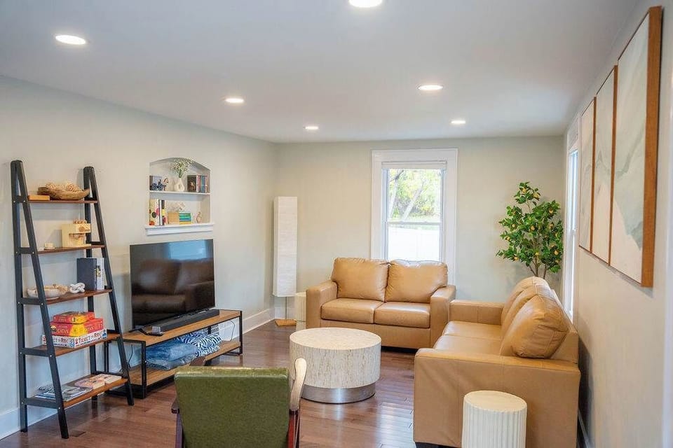 Living Room- Comfy seating, Smart TV, and open flow make this the perfect hangout zone.