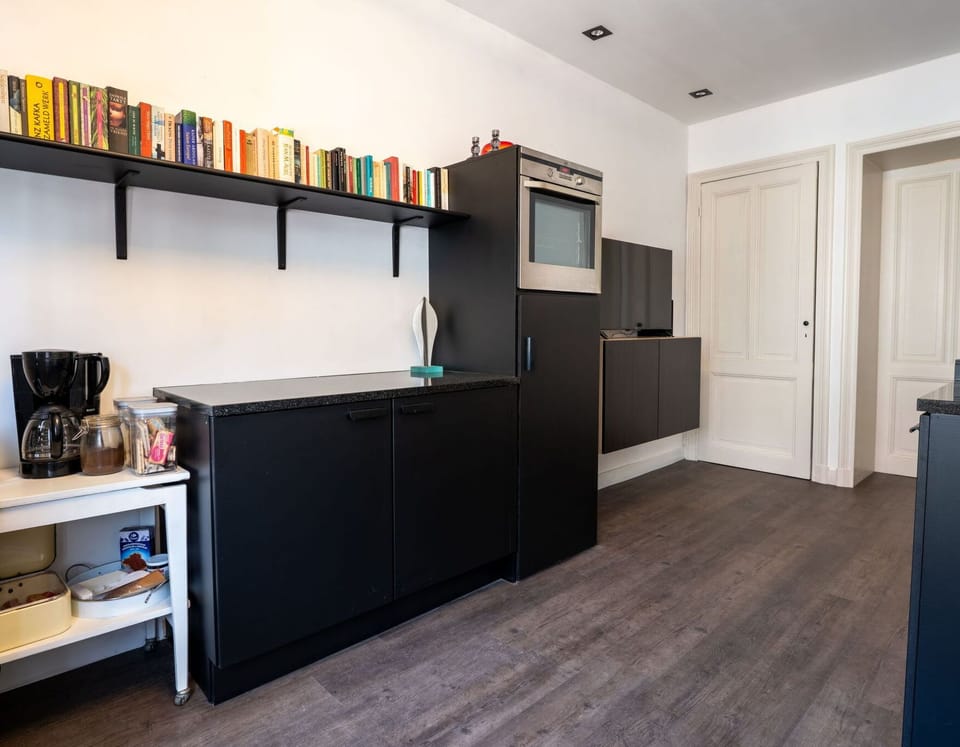 Flooring, Interior Design, Wood, Furniture, Floor, Shelving, Cabinetry, Countertop, Lighting, Room