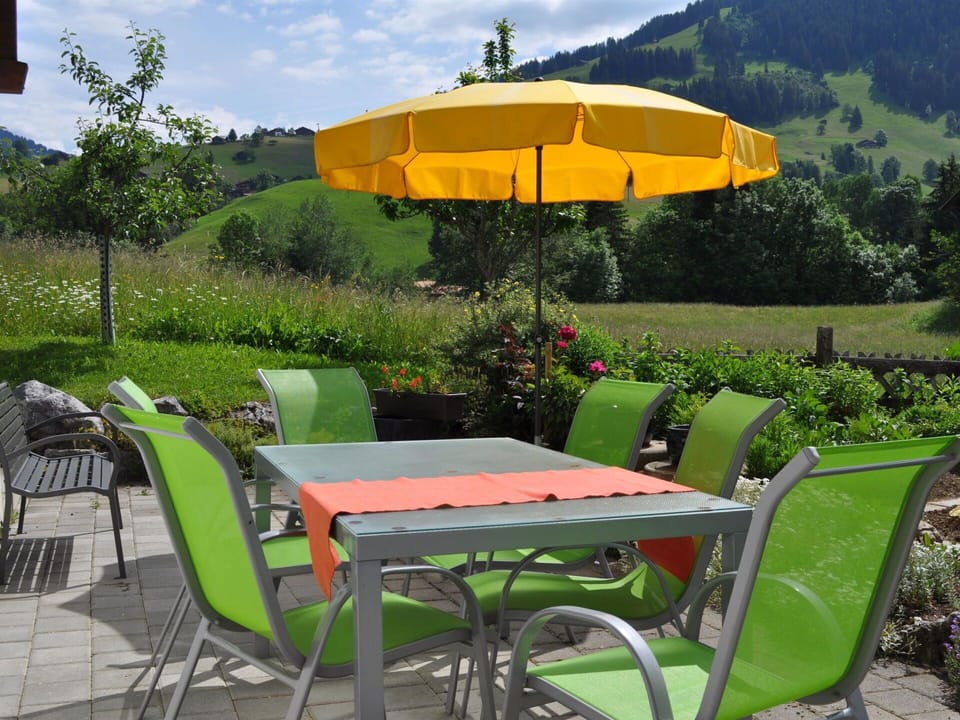 Furniture, Table, Outdoor Furniture, Chair, Outdoor Table, Kitchen & Dining Room Table, Restaurant, Umbrella, Shade, Patio