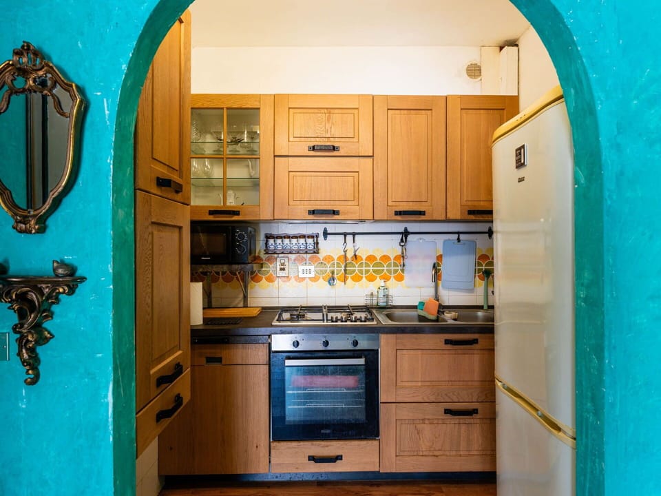 Interior Design, Wood, Kitchen, Flooring, Furniture, Countertop, Cabinetry, Floor, Room, Major Appliance
