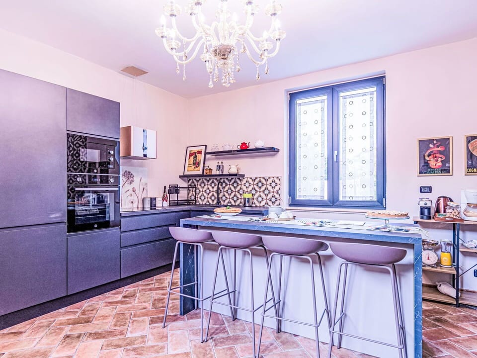 Furniture, Interior Design, Kitchen, Flooring, Floor, Countertop, Wood, Cabinetry, Kitchen Appliance, Ceiling