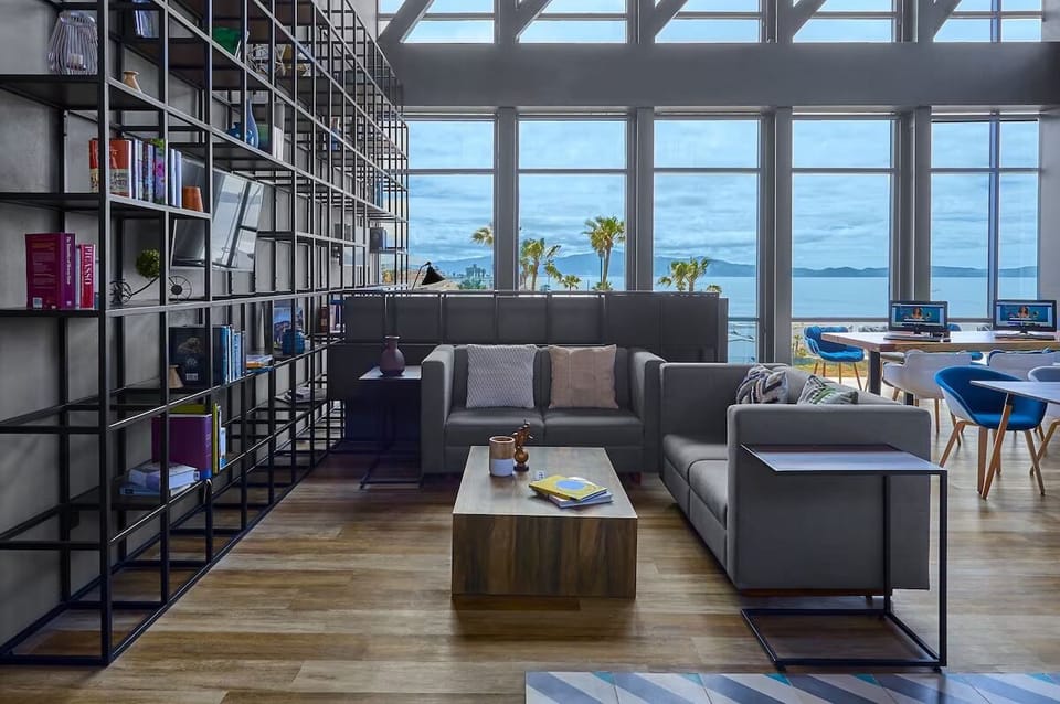 Sip, chat, and relax in a warm designer lounge nook.