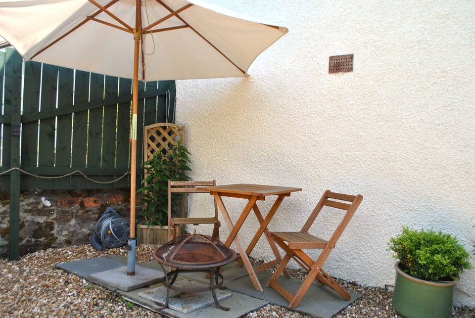 The garden has several seating spots to follow the sun