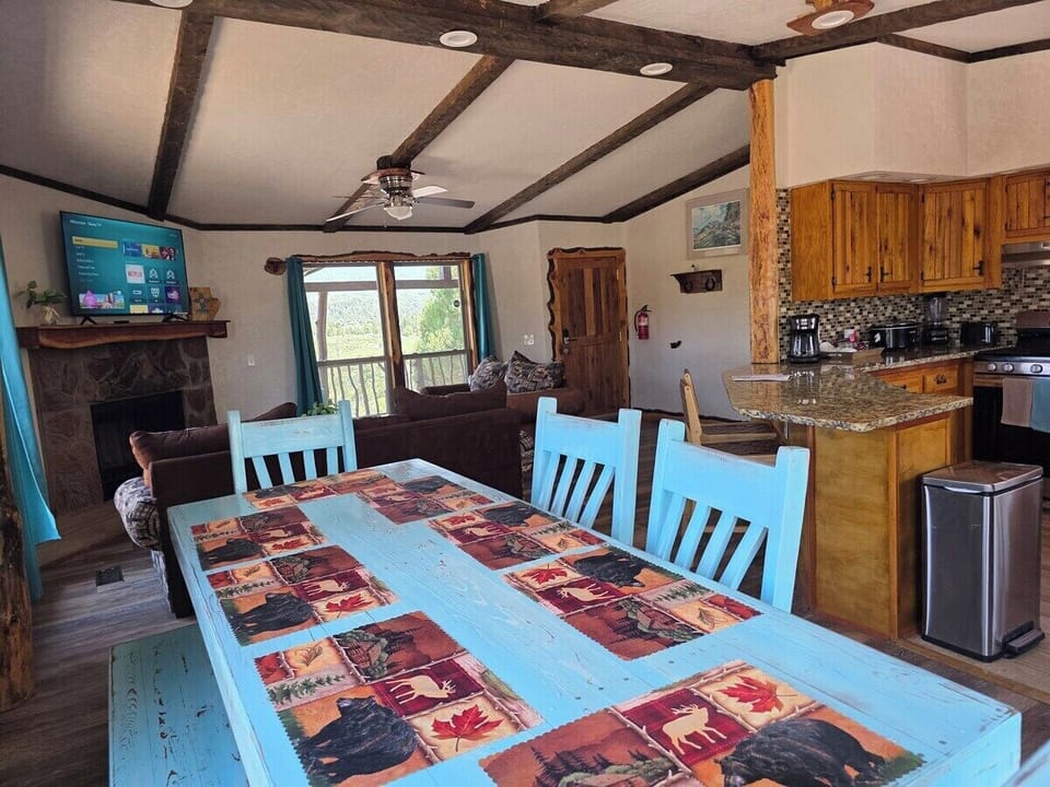 Hand-painted table seats six, right off the kitchen.