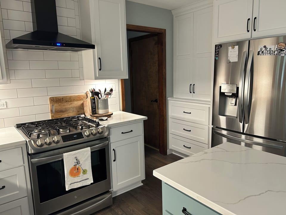 Fully stocked kitchen with stove, oven, microwave, dishwasher, coffee pot