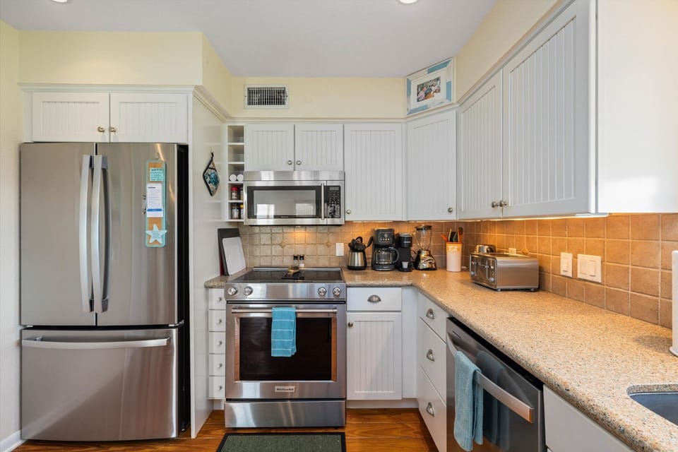 Fully stocked kitchen with everything you need to prepare and enjoy meals.