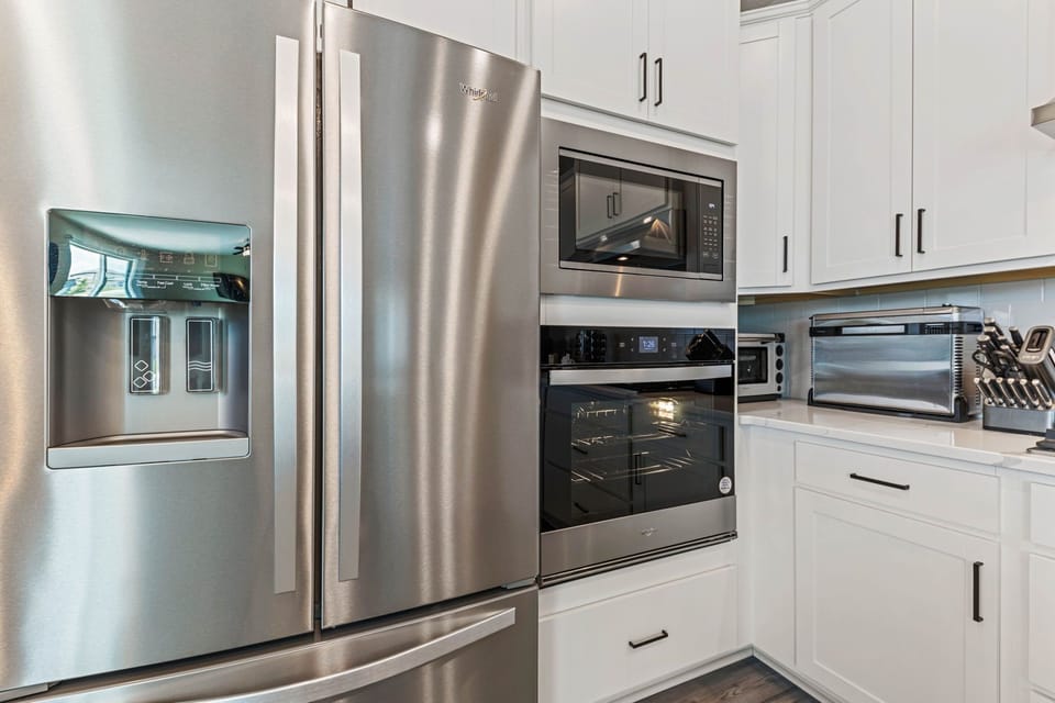 All stainless steel appliances make cooking in this home a dream. 