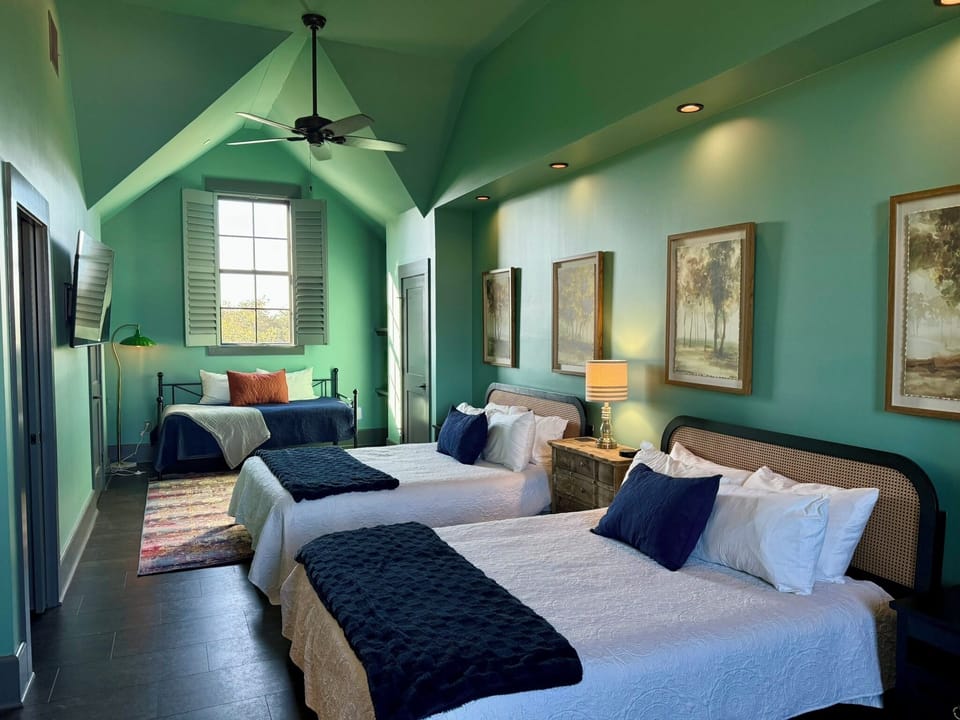 Spacious, third floor loft features two queen beds and two twin beds.