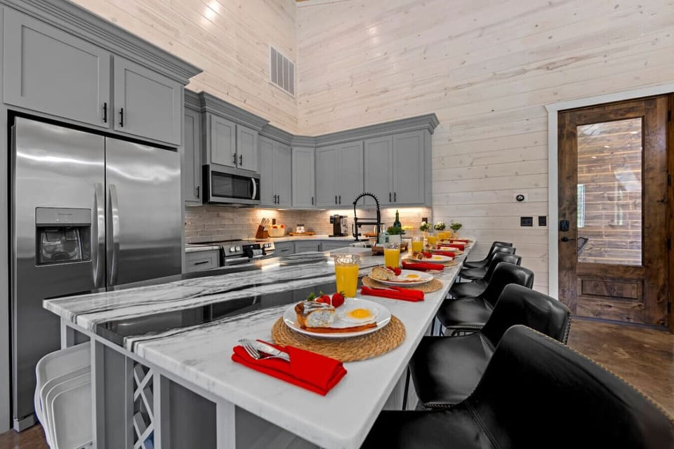 Start your day right in this stunning chef’s kitchen—where breakfast is served with style.