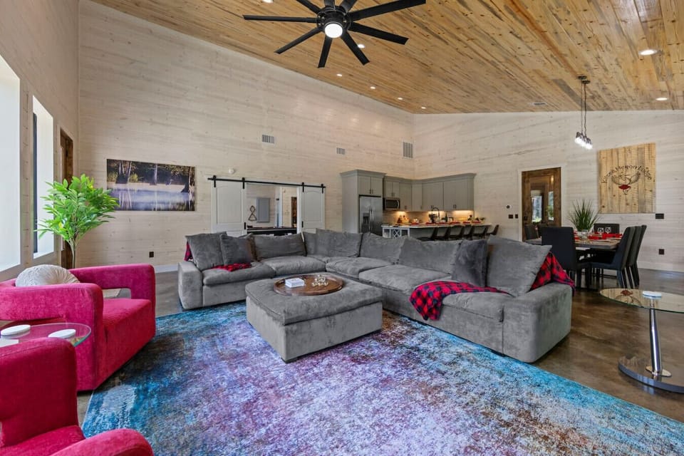 Cozy up in this rustic-chic living room—where comfort meets cabin charm.