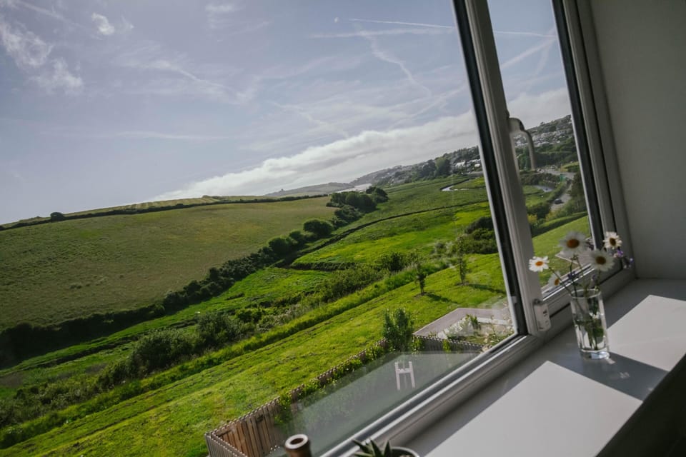 View from the main bedroom overlooking the Gannel Estuary and open countryside. 