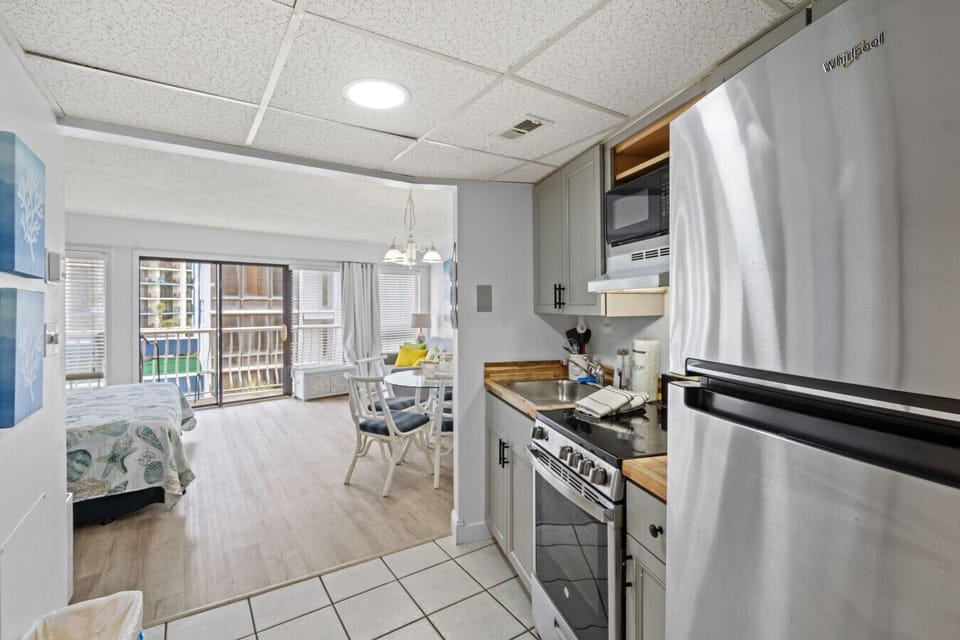 Fully equipped kitchen: stove, oven, full fridge, microwave, sink, Keurig & drip coffee makers, toaster & cabinet space. Cook vacation meals with ease in your home-away-from-home.