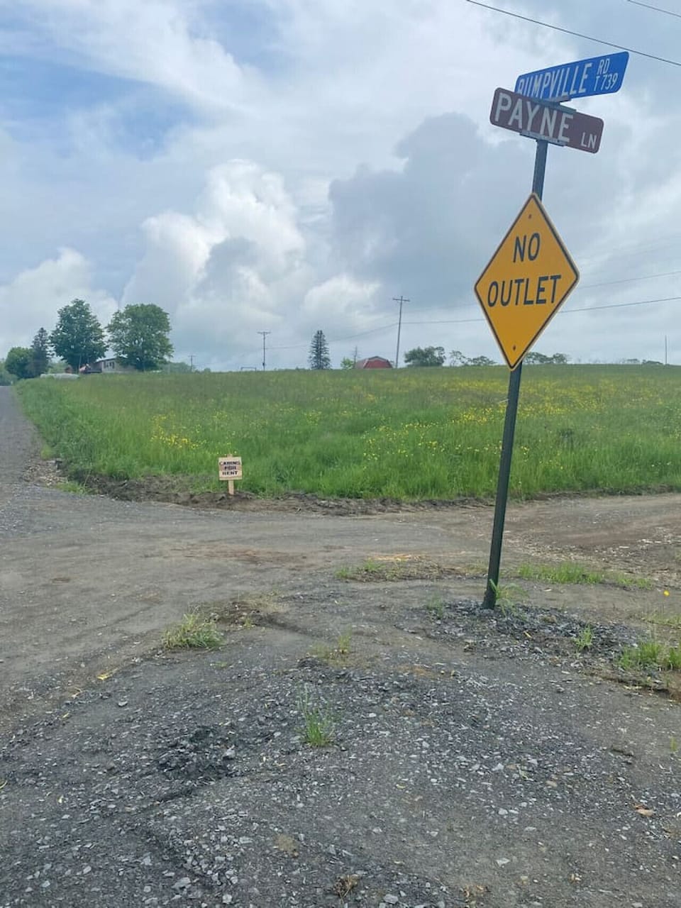 Sign to entrance of Payne road to gain access to the cabin