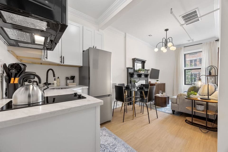 Apartment goals! Comfy sofa + modern kitchen = ultimate relaxation after a day of adventures.