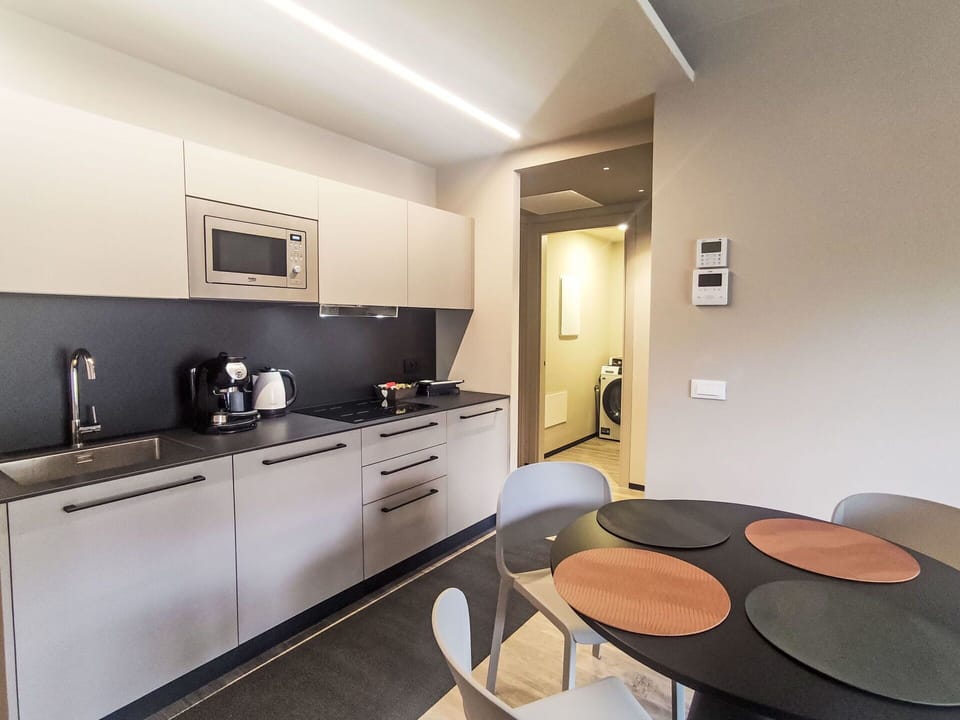 Interior Design, Flooring, Furniture, Ceiling, Floor, Lighting, Room, Countertop, Kitchen, Apartment