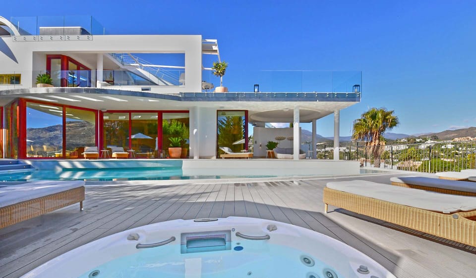 Jacuzzi and sun loungers.