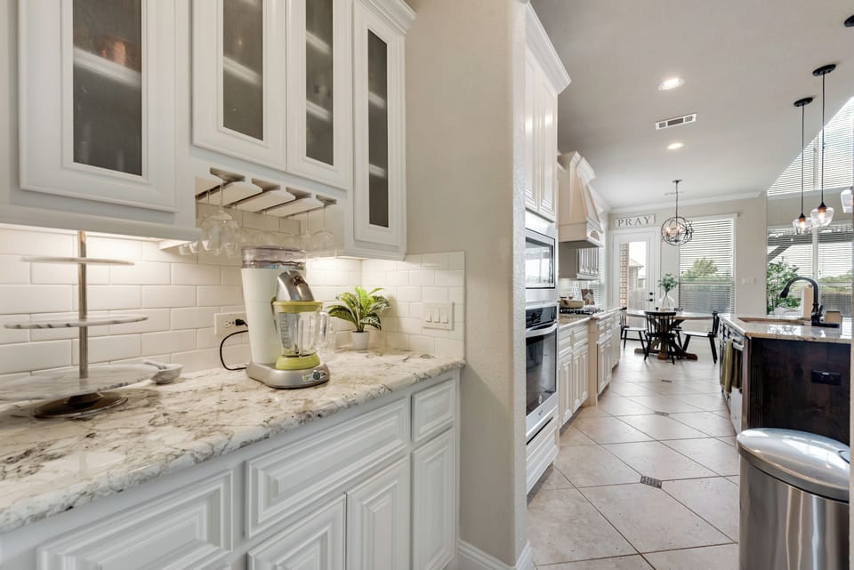 It's 5-Oclock somewhere, right? Come, unwind, and pour yourself a Margarita while leveraging the glassware conveniently stored in the butler's pantry. 
