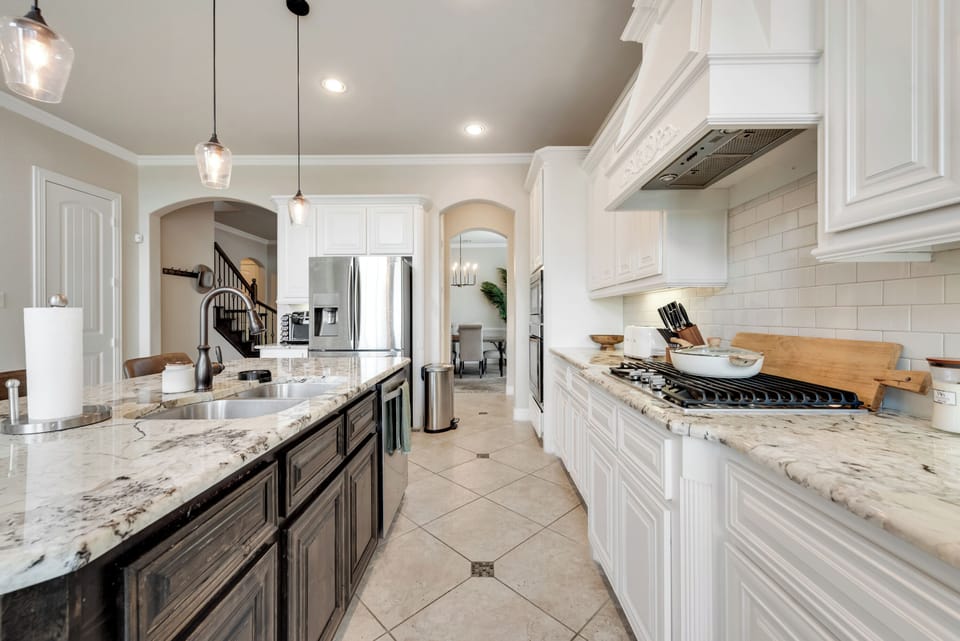 The large kitchen that opens up to the dining and living space is perfect for cooking and entertaining. 