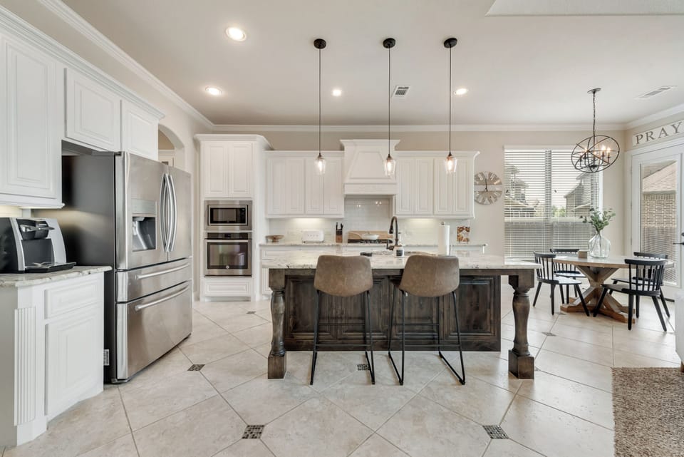 The large kitchen that opens up to the dining and living space is perfect for cooking and entertaining. 