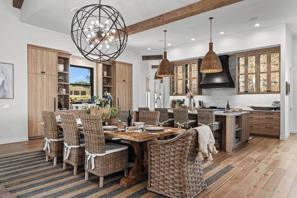 Sophisticated, spacious, and styled to perfection—entertain in elegance in this luxurious kitchen and dining area.
