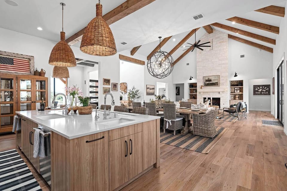 Multiple sinks and dishwashers make for a fully efficient kitchen experience.
