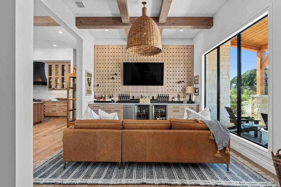Elevated Hill Country charm flows through this chic bar and lounge—crafted for cozy nights and effortless entertaining.